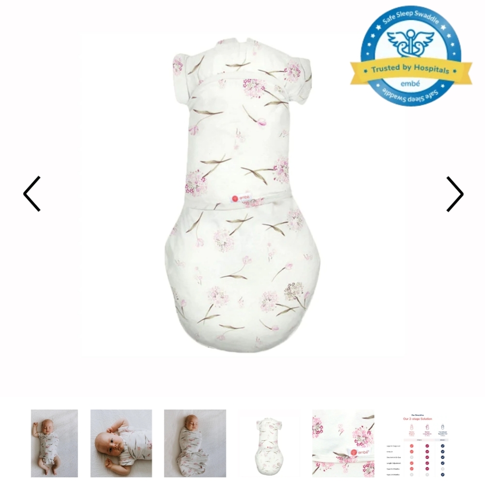 Embe transitional swaddle out pink and white floral size 12-18 lbs